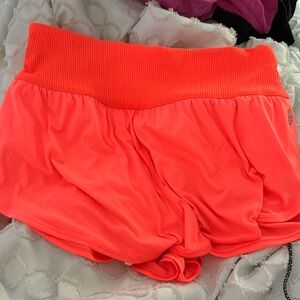 Free people movement game time shorts in orange